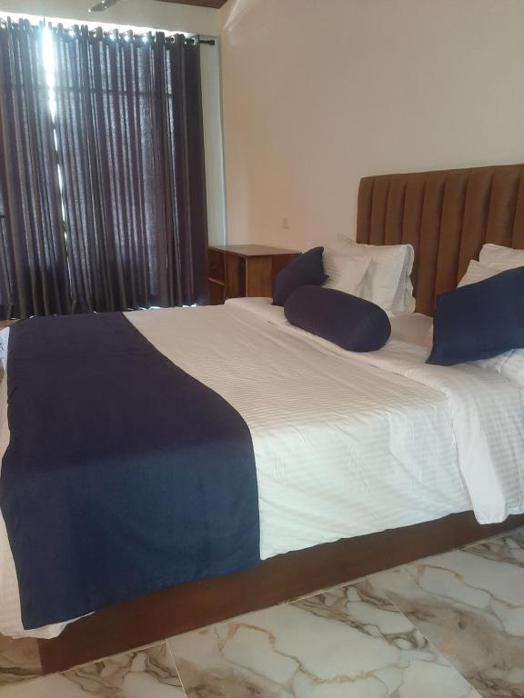 Postel nebo postele na pokoji v ubytování Welcome Homestay
