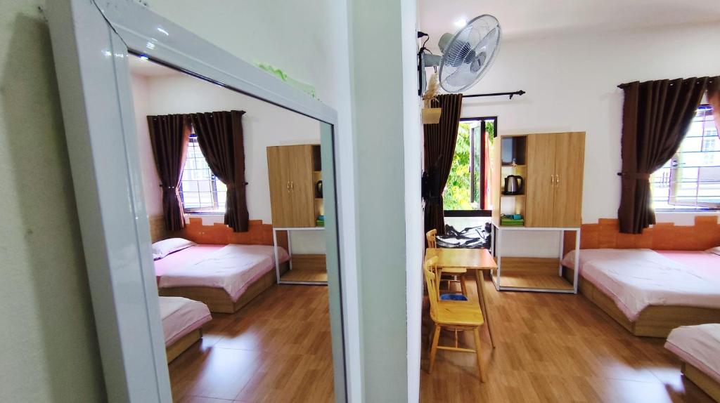 Postel nebo postele na pokoji v ubytování Homestay Halley