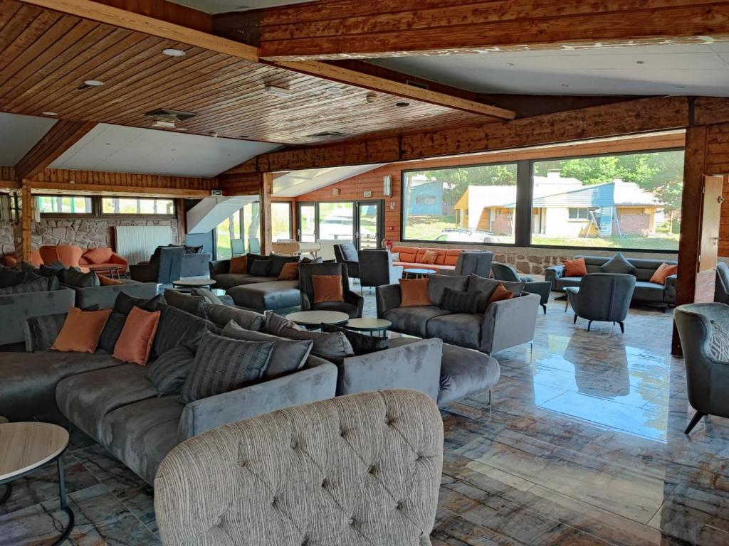 Posezení v ubytování Hotel Parc Les Cigognes