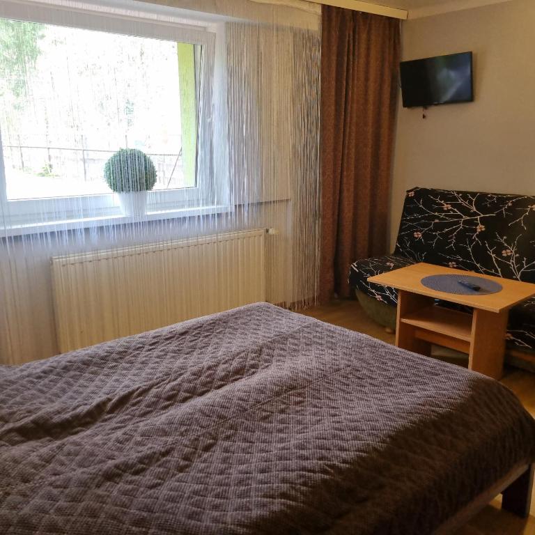 Postel nebo postele na pokoji v ubytování Alaska