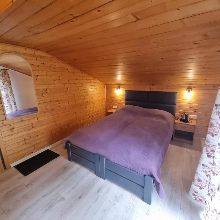 Postel nebo postele na pokoji v ubytování Alaska