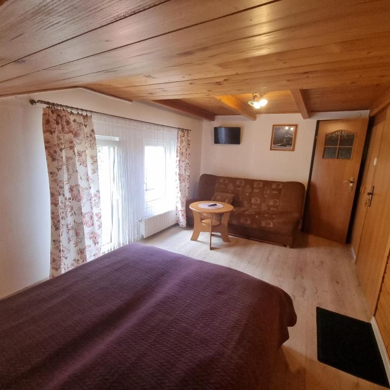 Postel nebo postele na pokoji v ubytování Alaska