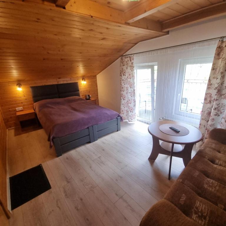 Postel nebo postele na pokoji v ubytování Alaska