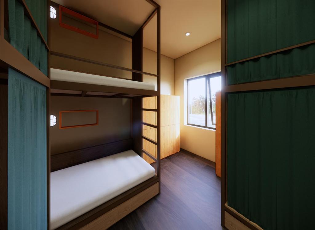 Postel nebo postele na pokoji v ubytování Rebel Rooster Hostel
