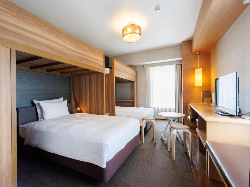 TV a/nebo společenská místnost v ubytování Hotel Resol Trinity Hakata