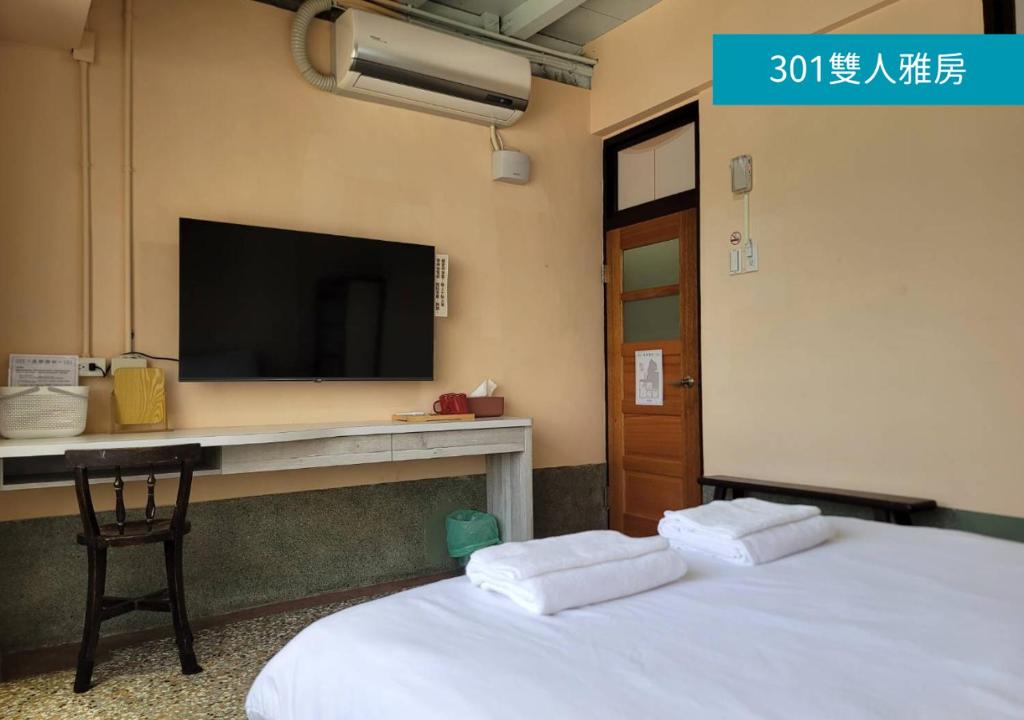 TV a/nebo společenská místnost v ubytování Romance Guest House