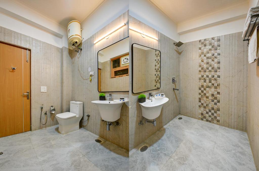 Koupelna v ubytování Aamantran Residency Hotel, Sohna Road, Sector 49, Gurugram