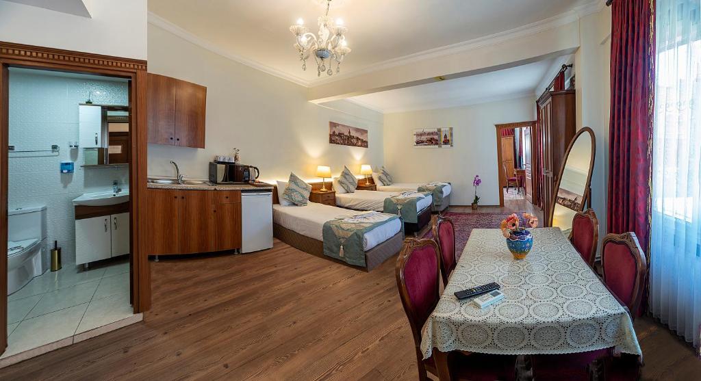 Postel nebo postele na pokoji v ubytování Sultan House