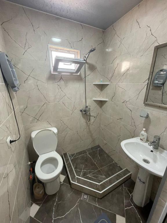 Koupelna v ubytování Guesthouse Daelani