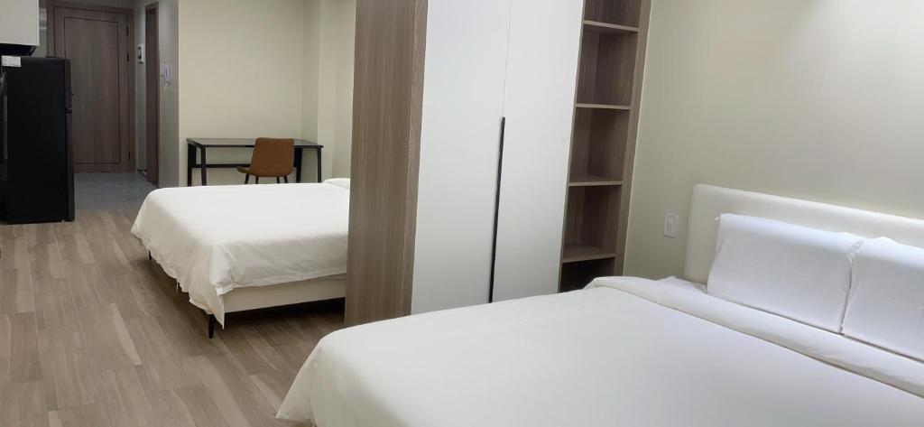 Voodi või voodid majutusasutuse City Center Executive Hotel-Near Manila Airport and PITX toas