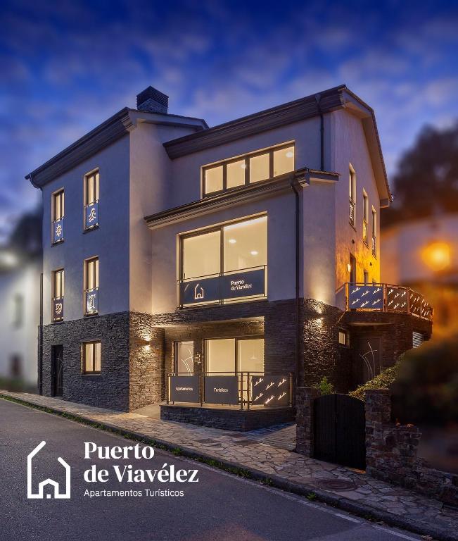a rendering of a villa with a building at Apartamentos PUERTO DE VIAVELEZ in Viavélez