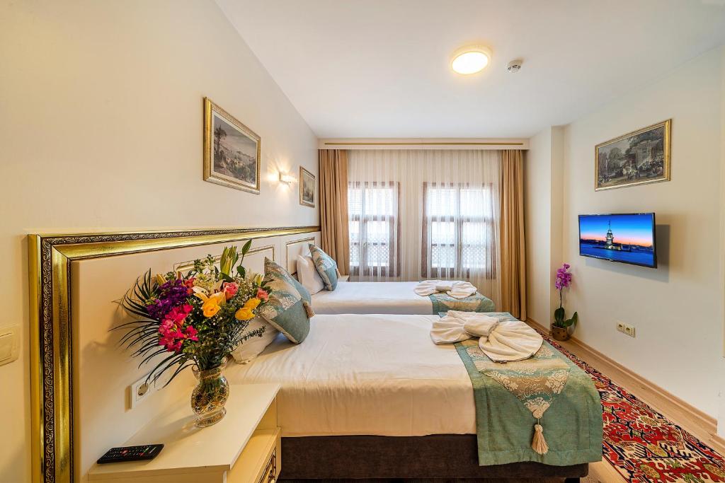 Postel nebo postele na pokoji v ubytování Sultan House