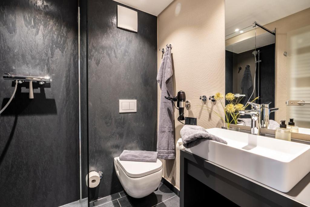 Koupelna v ubytování Arthotel Bakker