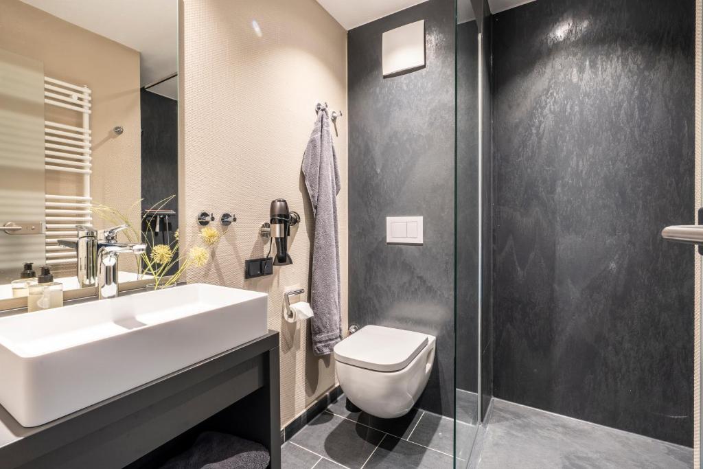Koupelna v ubytování Arthotel Bakker
