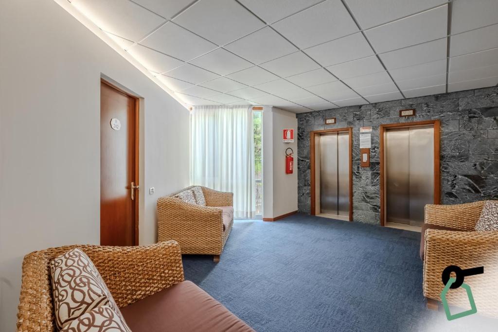 Posezení v ubytování HOTIDAY Room Collection - Porto Azzurro