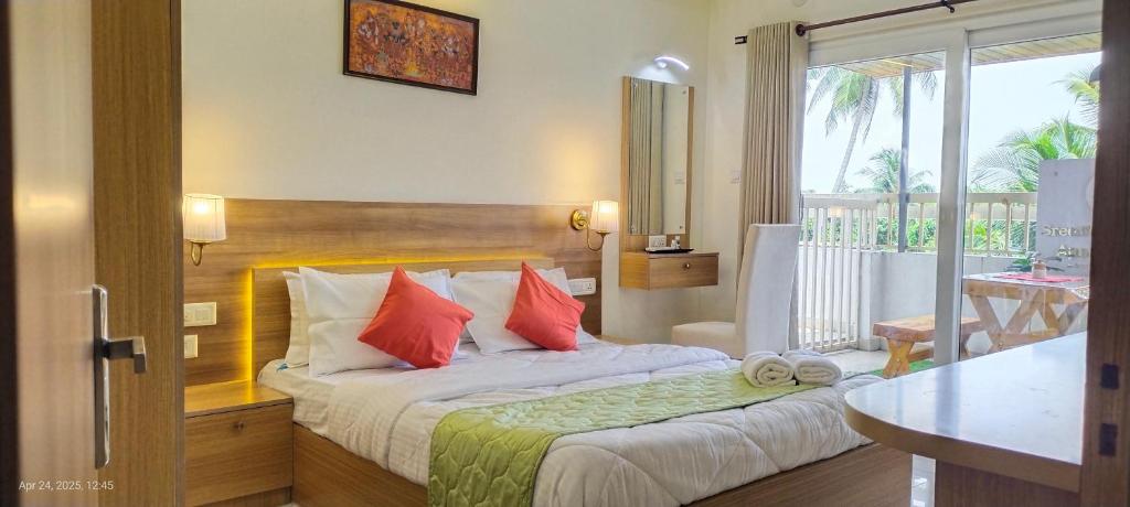 Postel nebo postele na pokoji v ubytování Sree Nandhanam apartment's