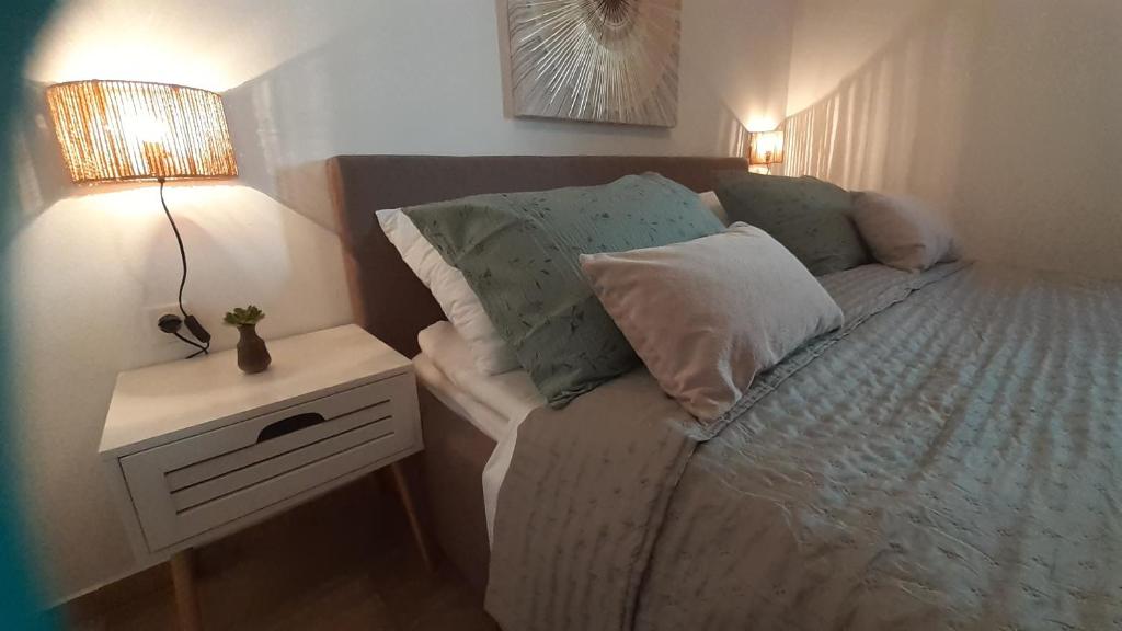 Posteľ alebo postele v izbe v ubytovaní apartmani G&M