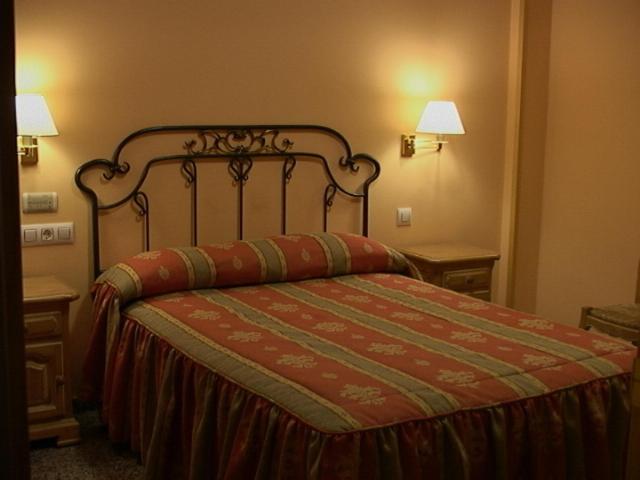 Postel nebo postele na pokoji v ubytování Hotel Restaurante Los Angeles