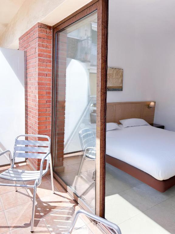 Postel nebo postele na pokoji v ubytování Hotel Primavera