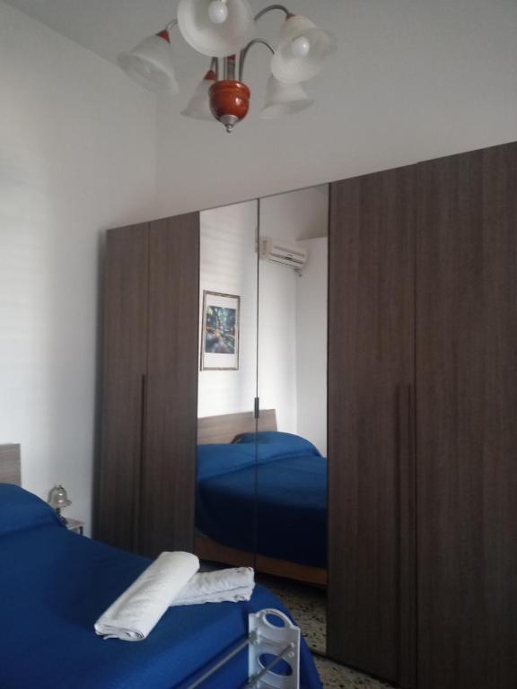 Voodi või voodid majutusasutuse Casa Rosati toas