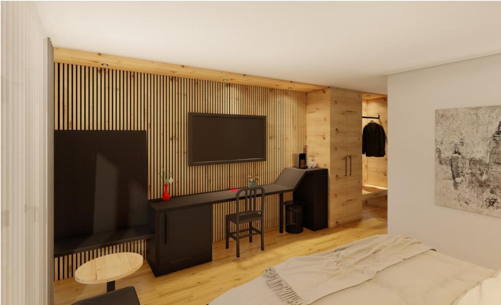 TV a/nebo společenská místnost v ubytování Seemöwe Swiss Quality Hotel