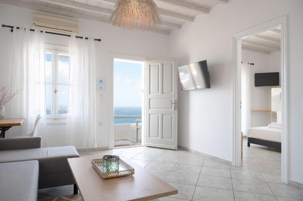 A television and/or entertainment centre at Amelie Suites Mykonos