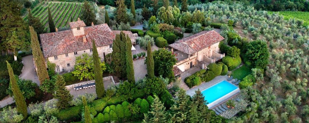 an aerial view of a house with a swimming pool at Il Casolese, Private Pool, Nature, Greve In Chianti in Greve in Chianti