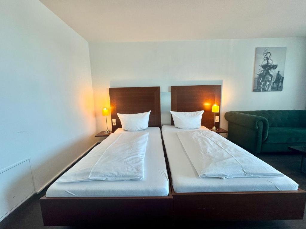 Postel nebo postele na pokoji v ubytování MY Parkhotel by AR Hotels
