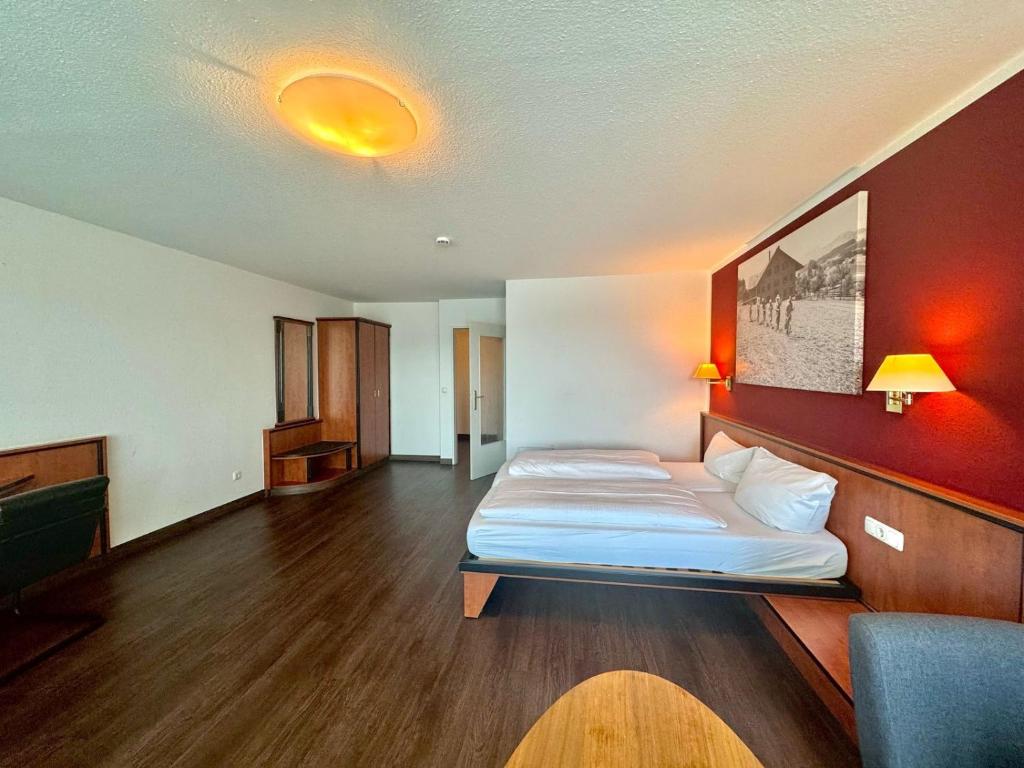 Postel nebo postele na pokoji v ubytování MY Parkhotel by AR Hotels