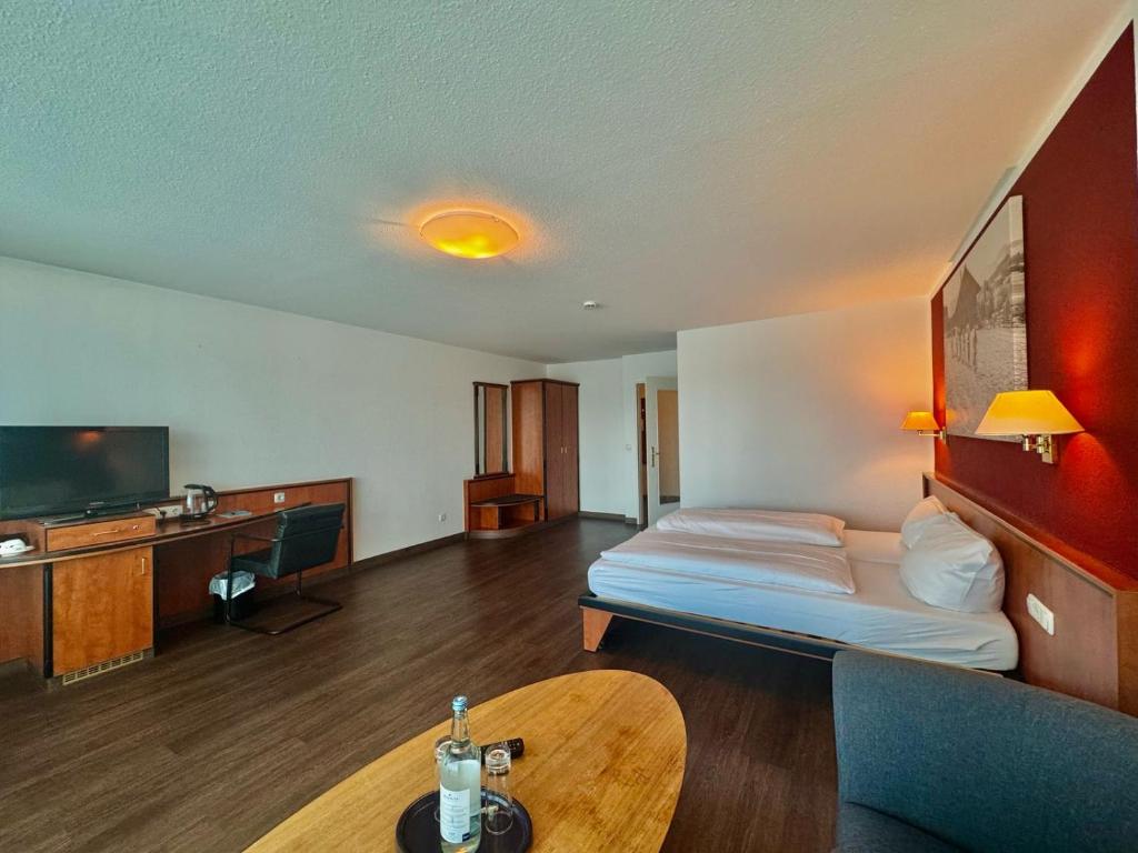 TV a/nebo společenská místnost v ubytování MY Parkhotel by AR Hotels