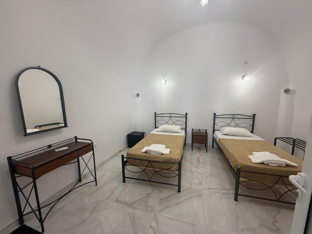 Postel nebo postele na pokoji v ubytování Hotel Hellas