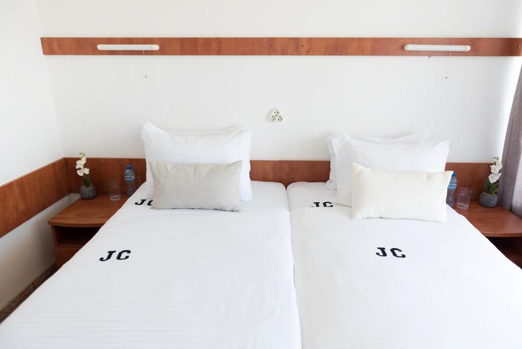 A bed or beds in a room at International Home of Scientists Joliot Curie