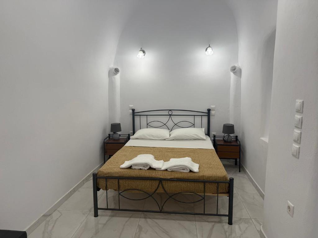 Postel nebo postele na pokoji v ubytování Hotel Hellas