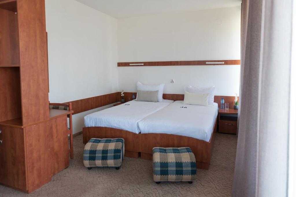 A bed or beds in a room at International Home of Scientists Joliot Curie