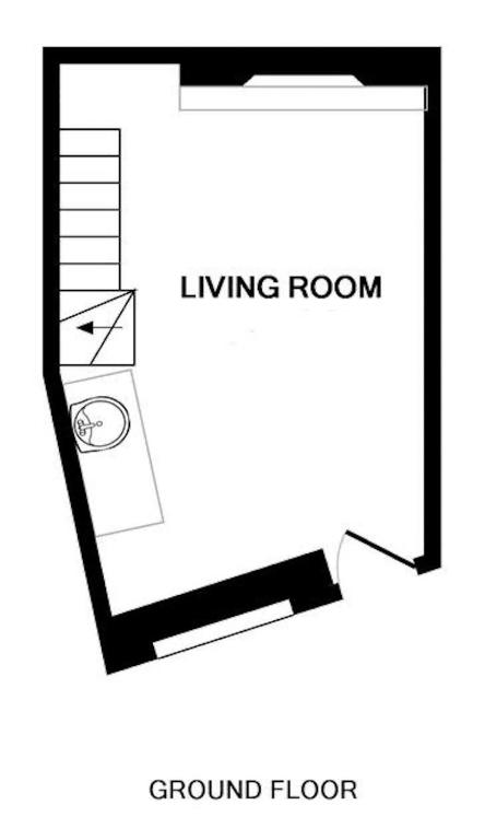 a floor plan of a living room and a ground floor at The Bakehouse in Port Isaac