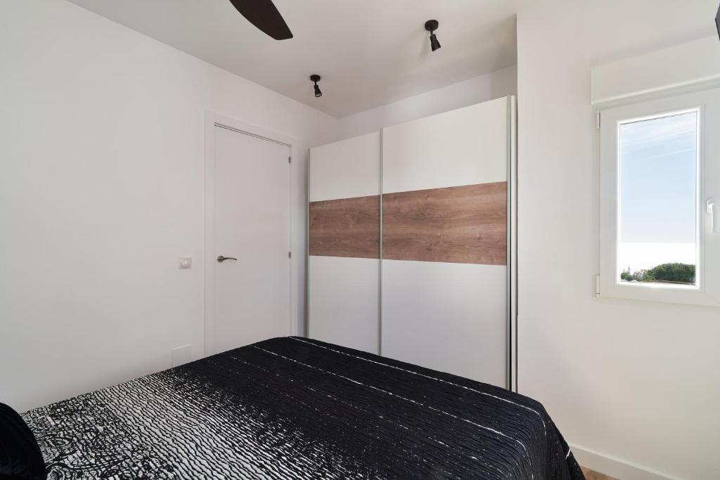 Postel nebo postele na pokoji v ubytování Manilva Beach Apartment