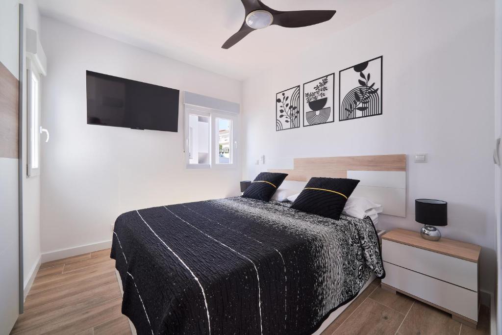 Postel nebo postele na pokoji v ubytování Manilva Beach Apartment