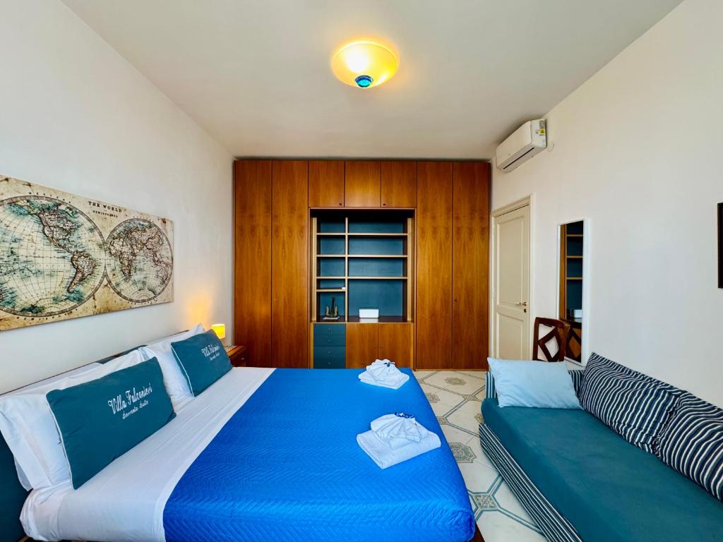 Posteľ alebo postele v izbe v ubytovaní Villa Falconieri Sorrento Suite