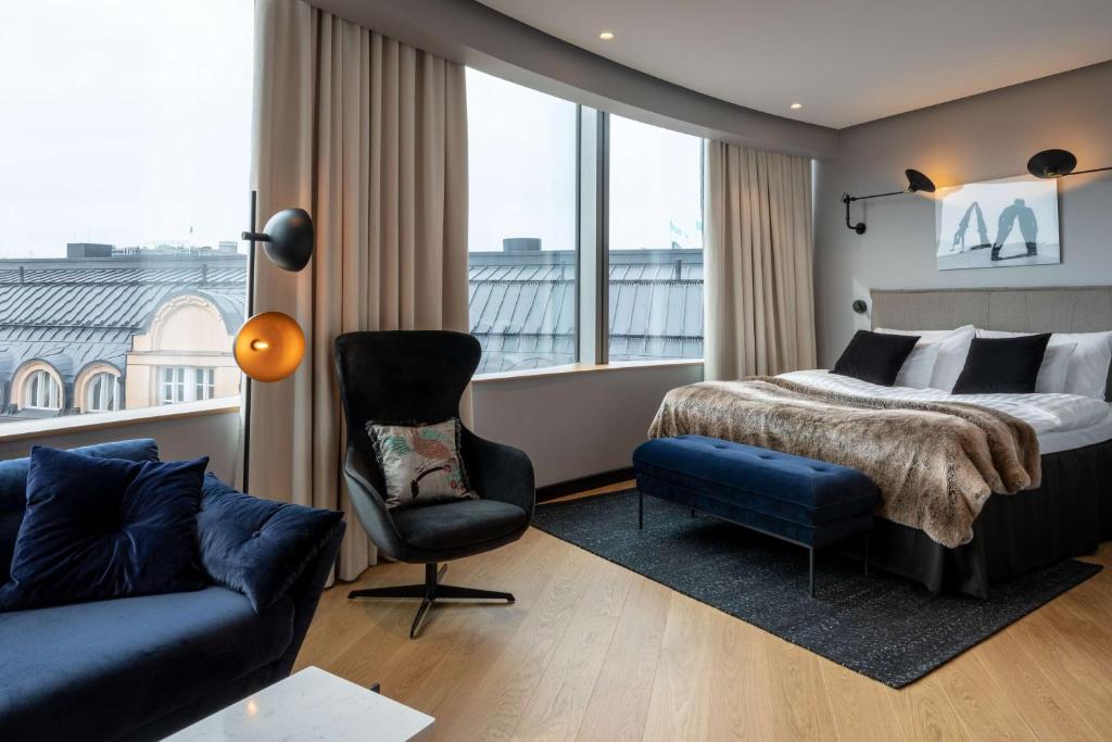 Scandic Grand Central Helsinki房間的床