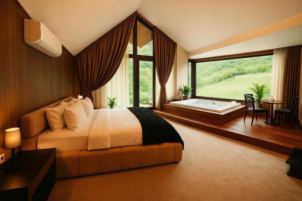 Postel nebo postele na pokoji v ubytování Resort Ujevara e Drinit