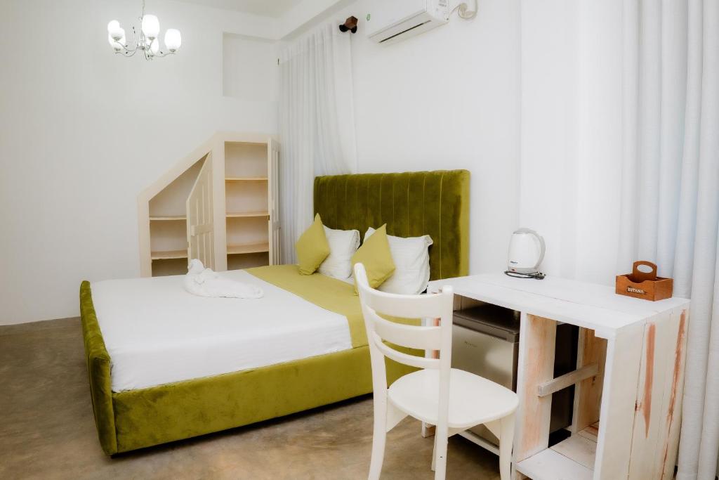 Postel nebo postele na pokoji v ubytování Istana Villa Mirissa