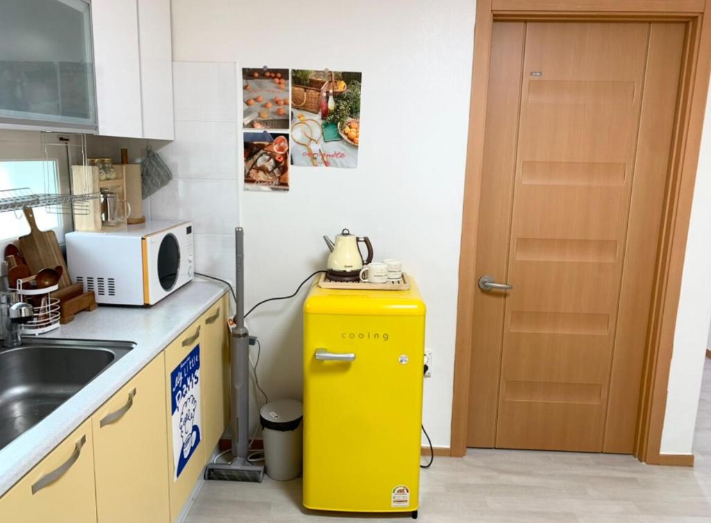 Kuchyň nebo kuchyňský kout v ubytování Stay Warm