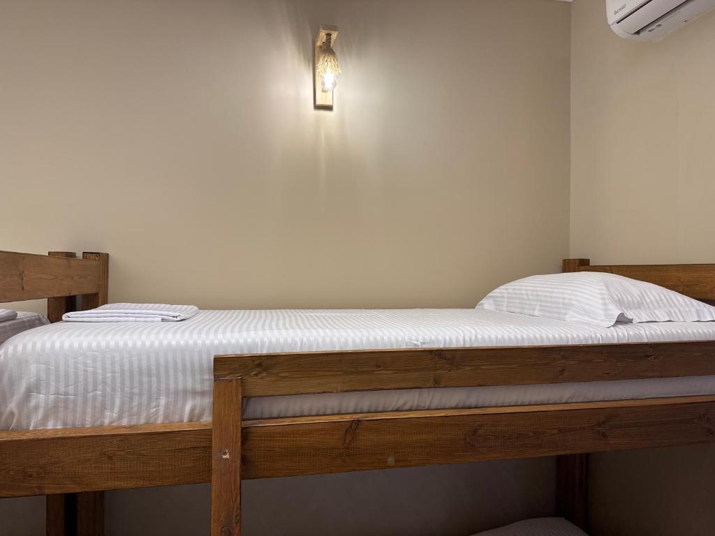 Postel nebo postele na pokoji v ubytování Vila Kaci