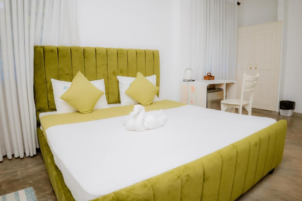 Postel nebo postele na pokoji v ubytování Istana Villa Mirissa