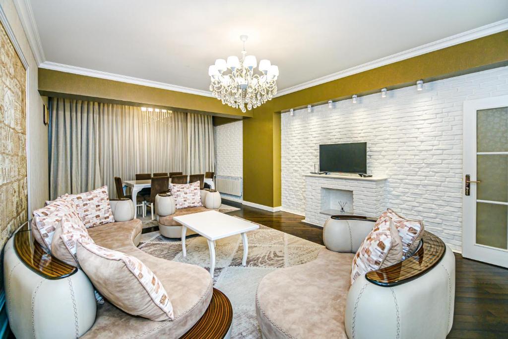 تصویر اتاق‌های Park Azure cozy apartment by Baku Housing - تصویر ۲