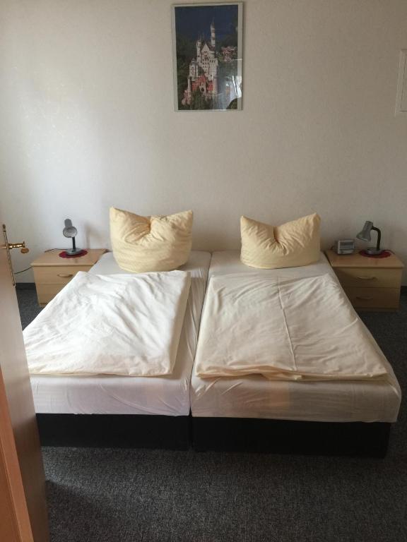 Postel nebo postele na pokoji v ubytování Ferienwohnung Wede