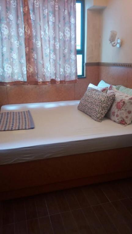 Postel nebo postele na pokoji v ubytování Toronto Motel Hk