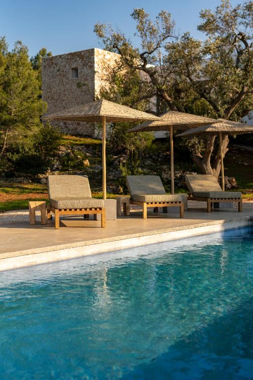 Bazén v ubytování Botanico Villa & Suites nebo v jeho okolí