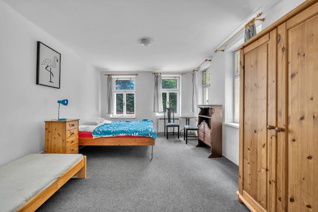 Postel nebo postele na pokoji v ubytování Apartmán pod Mariánskou horou