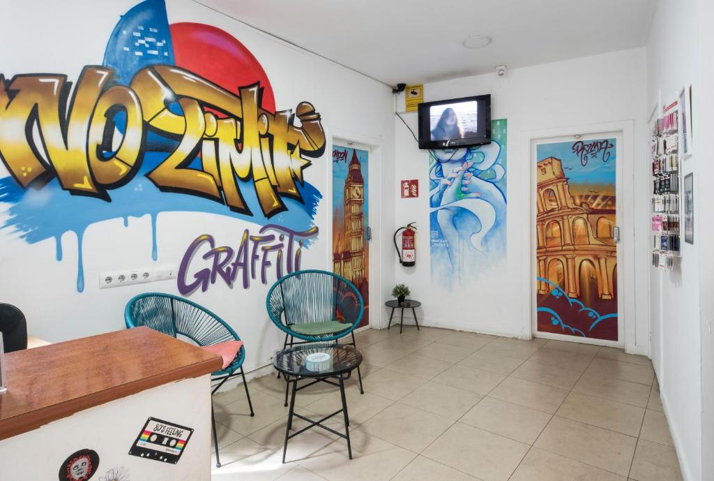 TV a/nebo společenská místnost v ubytování No Limit Hostel Graffiti